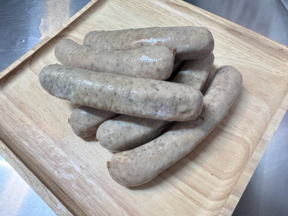 Smoked Kielbasa sausages arranged on a wooden board
