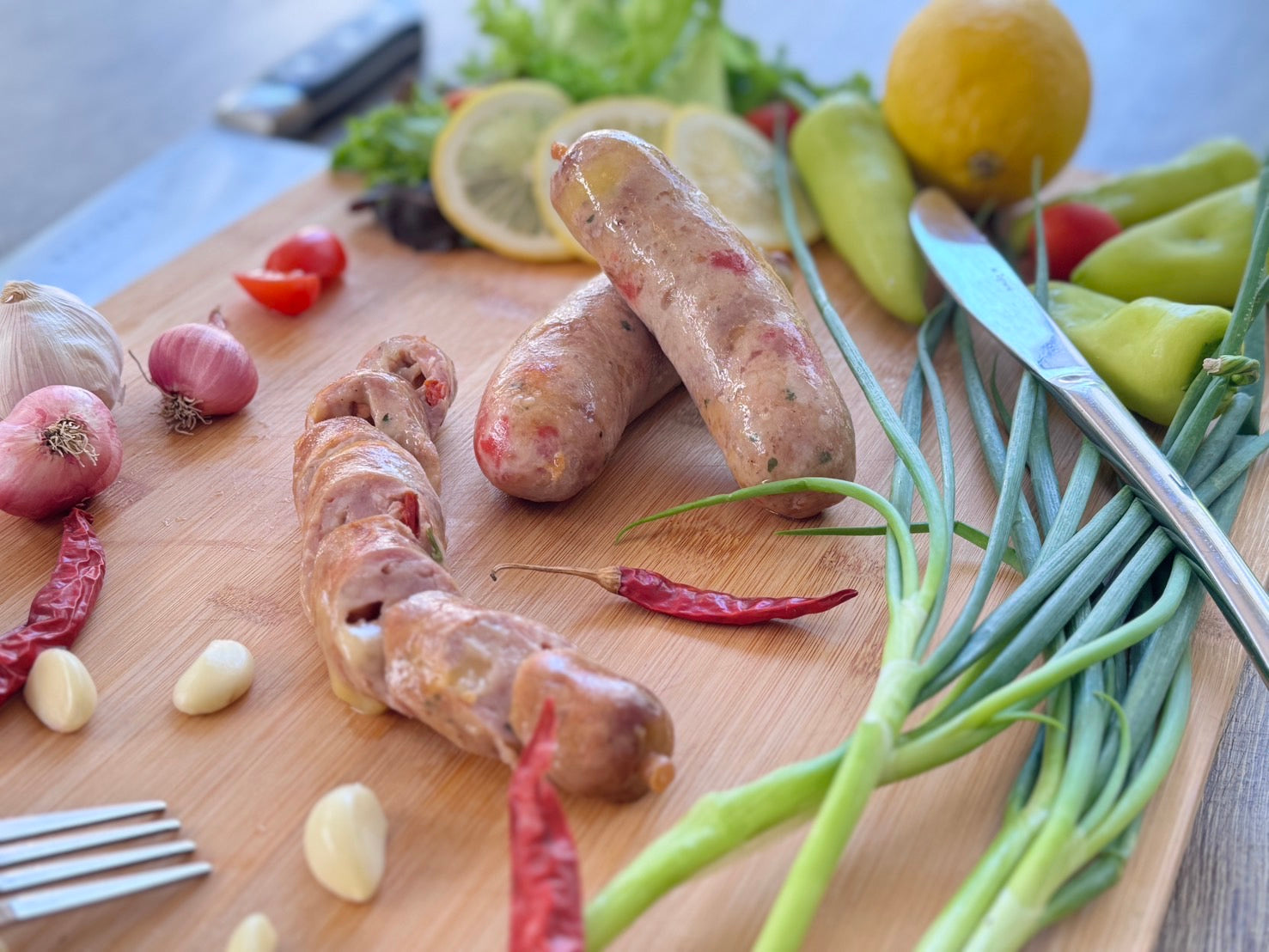 sliced Sicilian sausage on cutting board