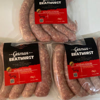 Packaged German Bratwurst sausages with visible labels on a white background