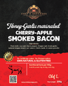 Advertisement for Chef's Sausages Honey-Garlic marinated Cherry-Apple Smoked Bacon with text and branding.